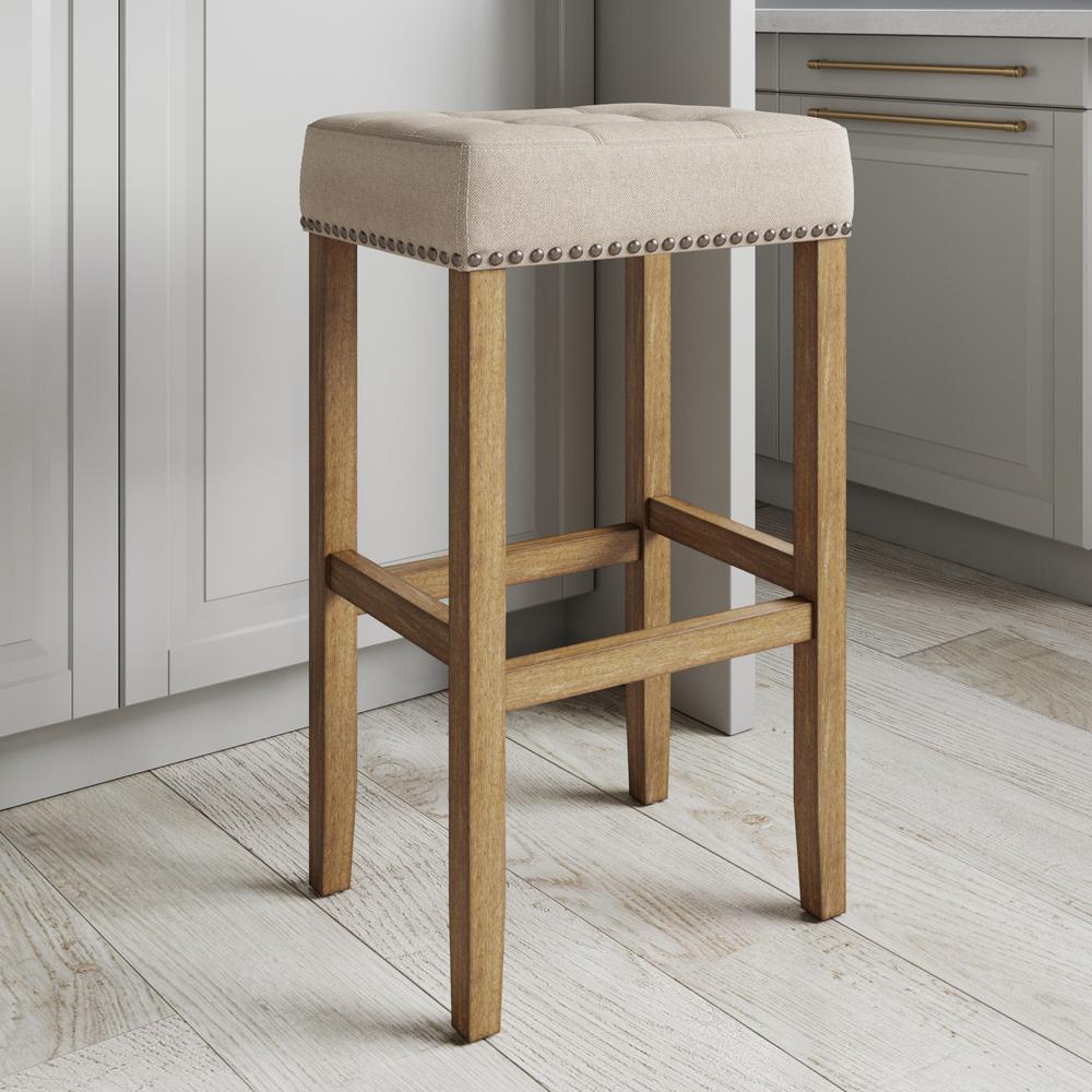 Nathan James Hylie 29 in. Natural Flax Nailhead Saddle Cushion Light Brown Wood Pub-Height Counter Bar Stool, Fabric Tufted Natural Flax/Light Brown
