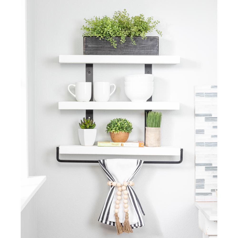 white shelf with towel bar