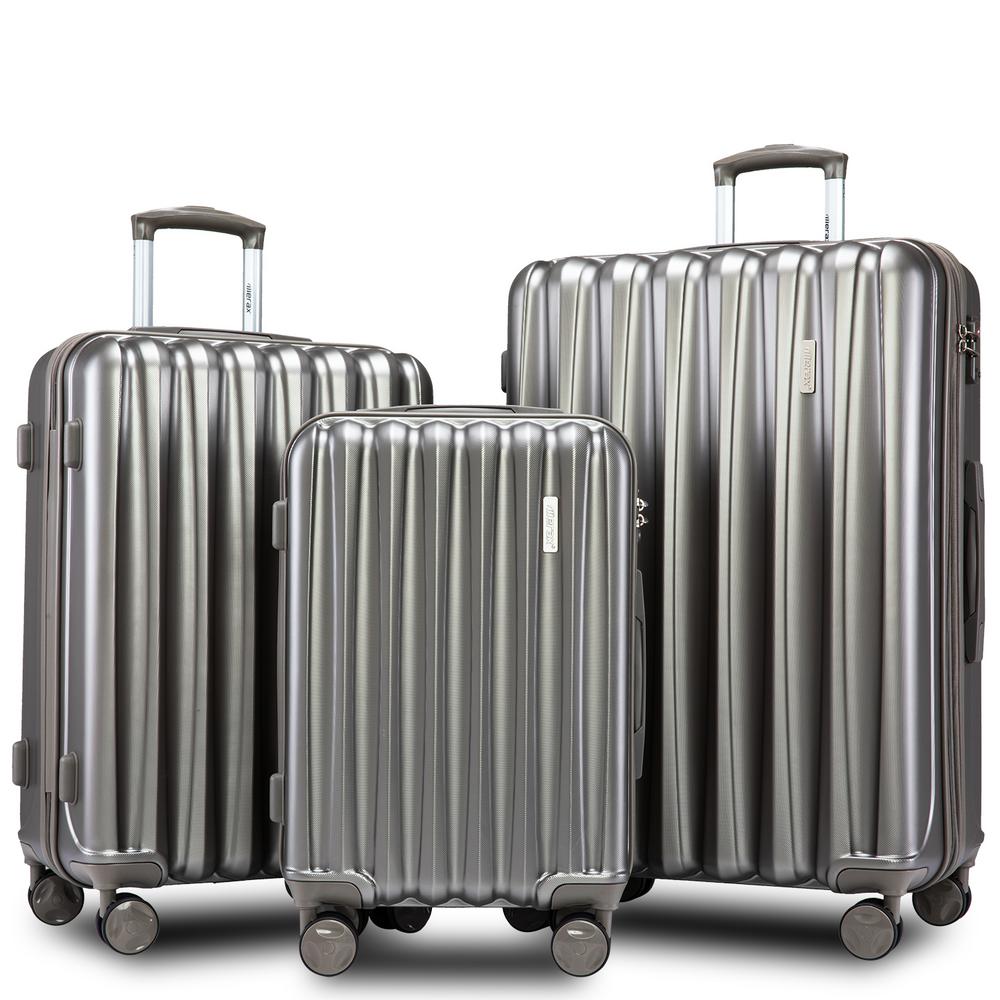 white and gold suitcase