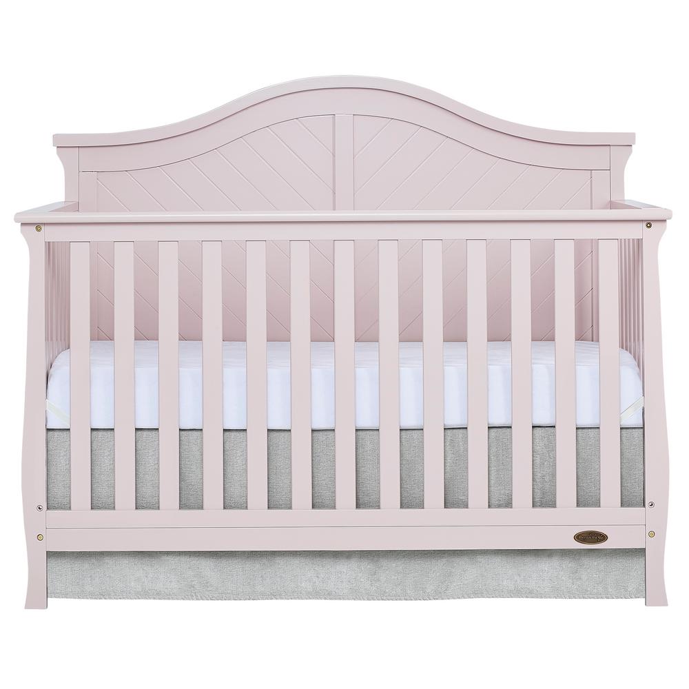 pink tufted crib