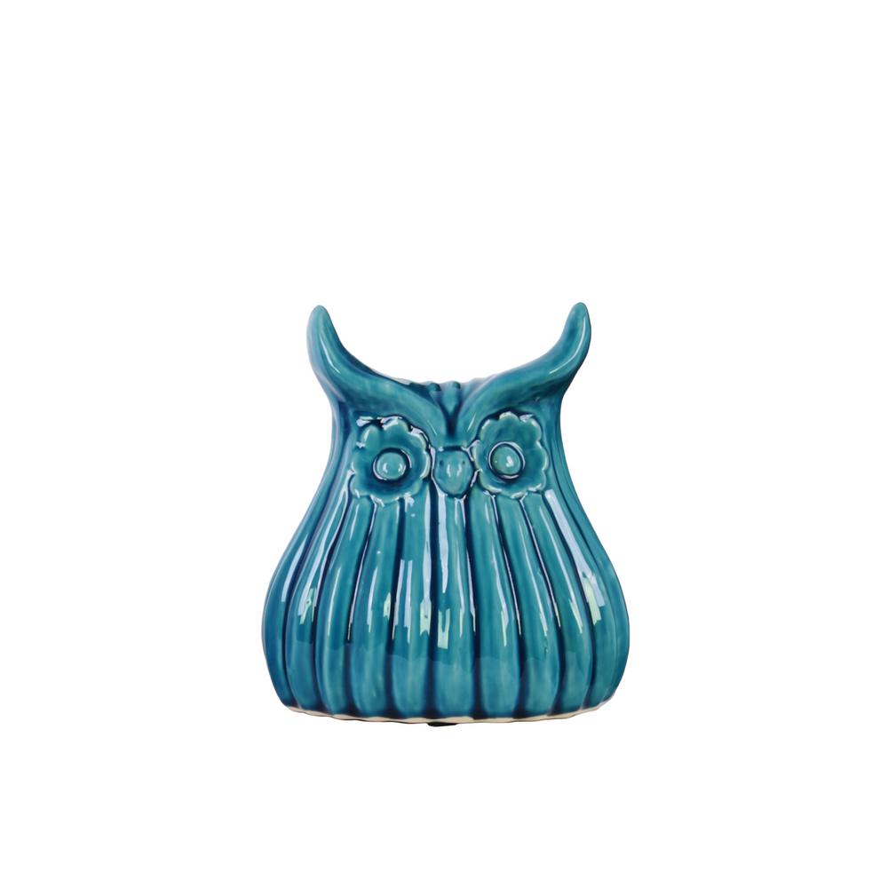 blue and white owl figurine