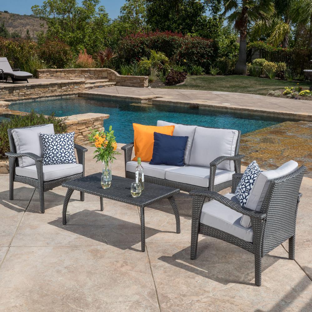 Noble House Honolulu Grey 4 Piece Wicker Patio Conversation Set With Grey Cushions 2662 The Home Depot