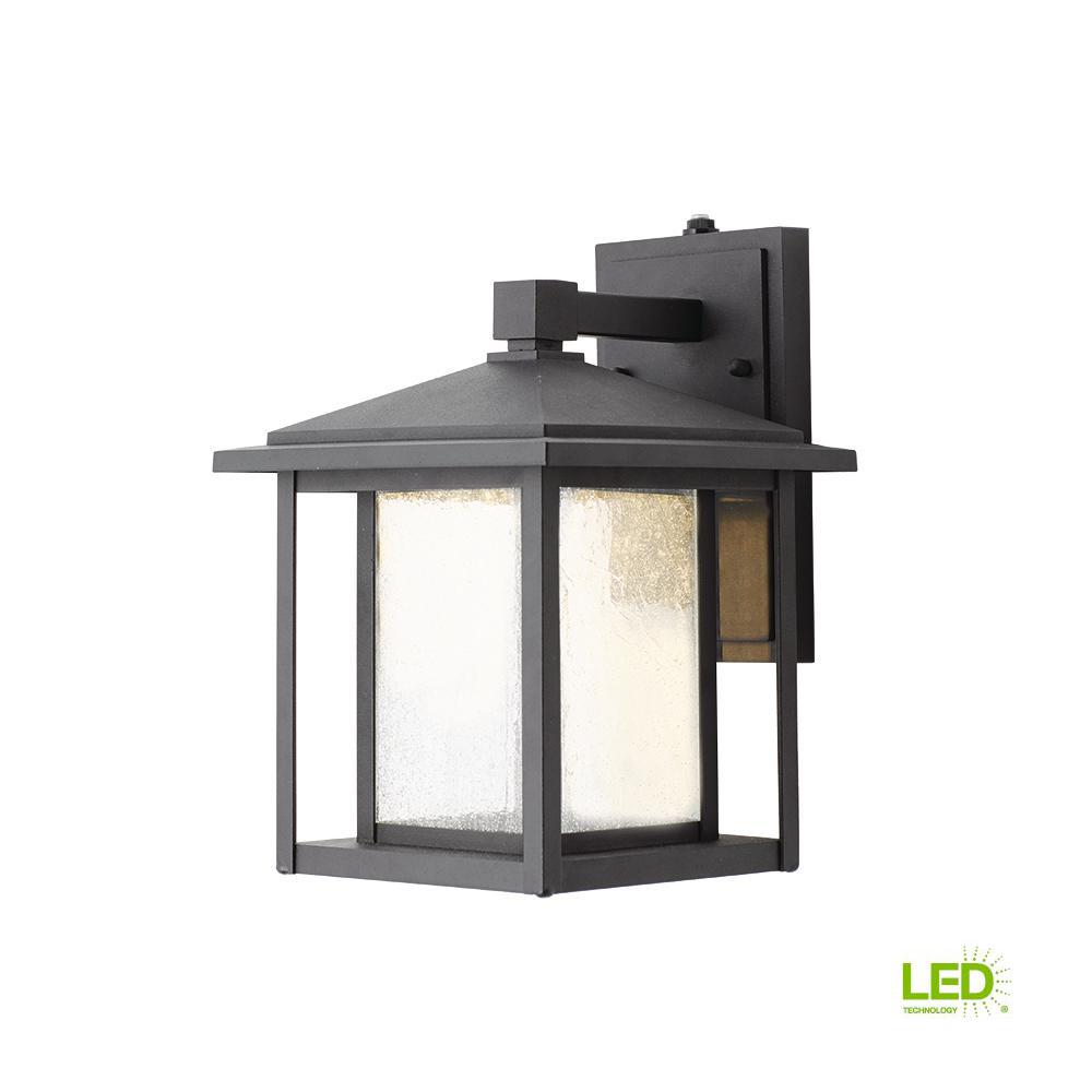 Black Outdoor Seeded Glass Dusk to Dawn Wall Lantern
