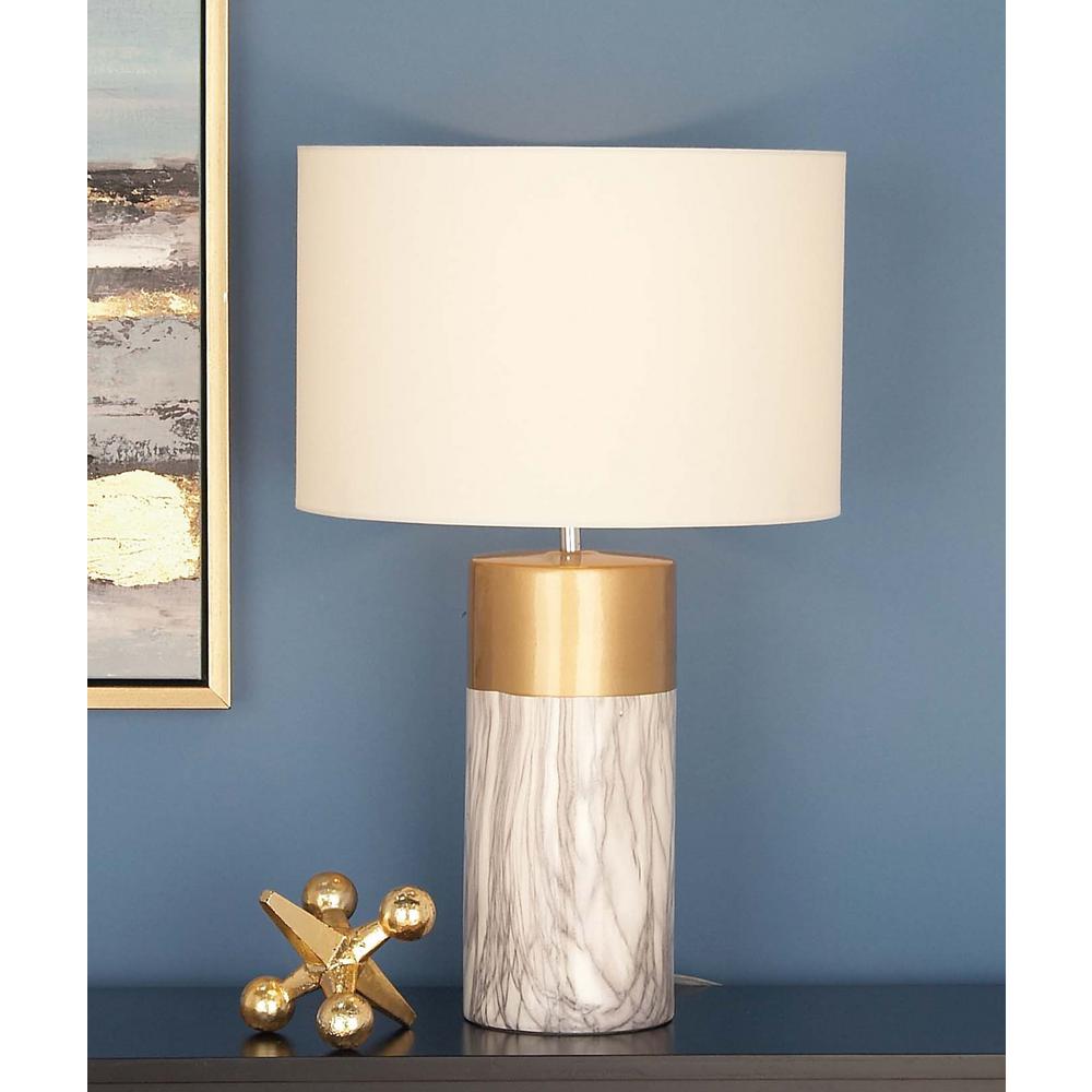 white and gold table lamp