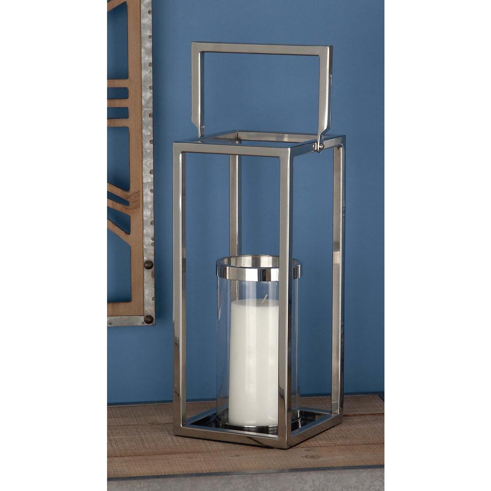 Litton Lane 18 In Silver Stainless Steel And Clear Glass Lantern Silver Stainless Steel And Clear Glass Lantern Candle Holder