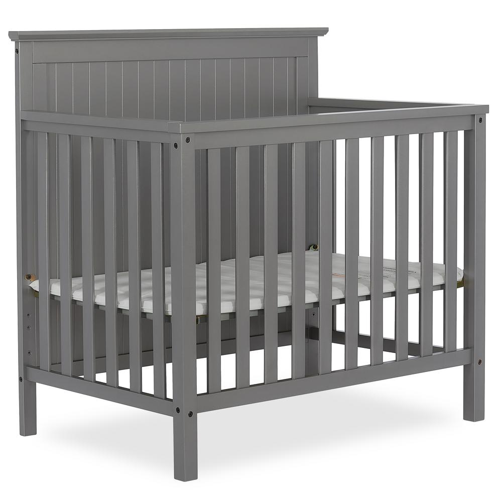 grey mini crib