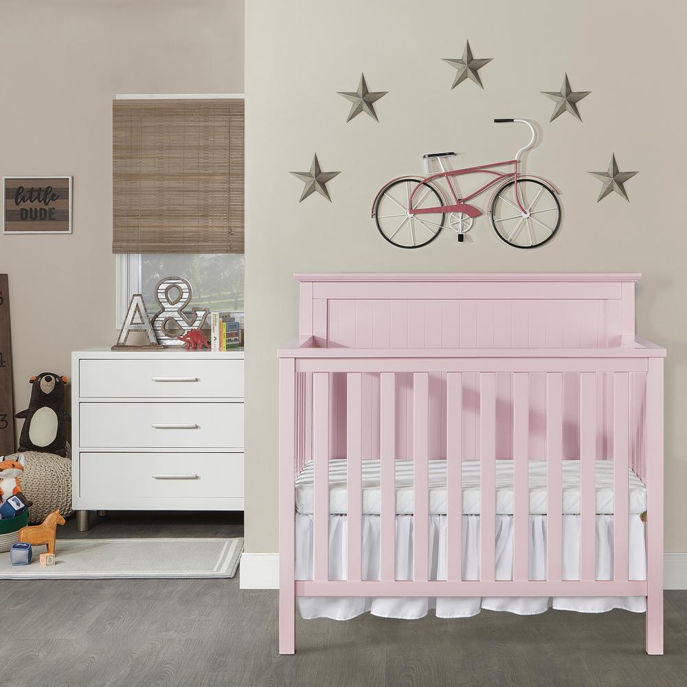 pink mini crib