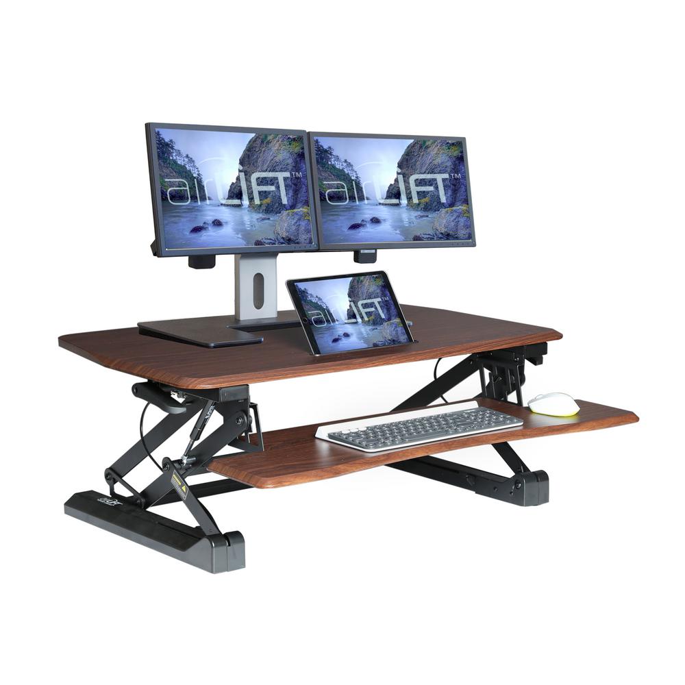 Seville Classics Airlift Walnut 35 4 In Height Adjustable Standing Desk Converter Workstation With Dual Monitor Riser And Keyboard Tray Off65840 The Home Depot