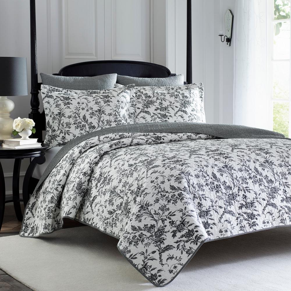 black and white quilts with a splash of color