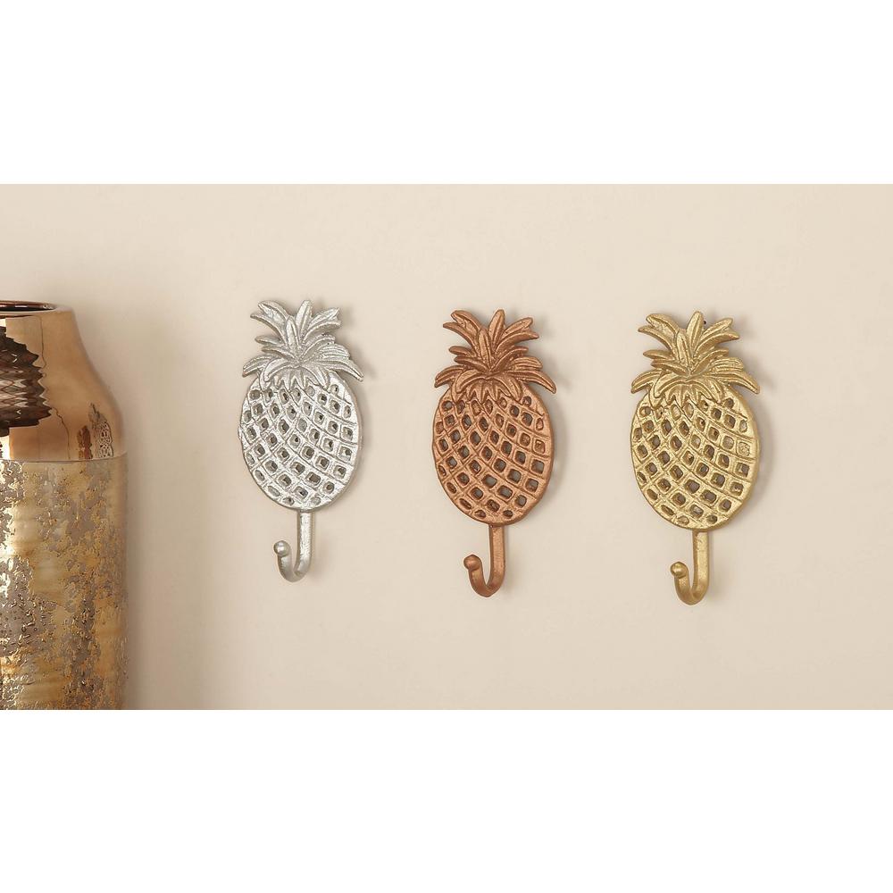 Litton Lane 4 In X 7 Tropical Iron Pineapple Wall Hooks Gold Tropical Iron Pineapple Wall Hooks In Gold Silver Or Bronze Finish 3 Pack 59420 The Home Depot