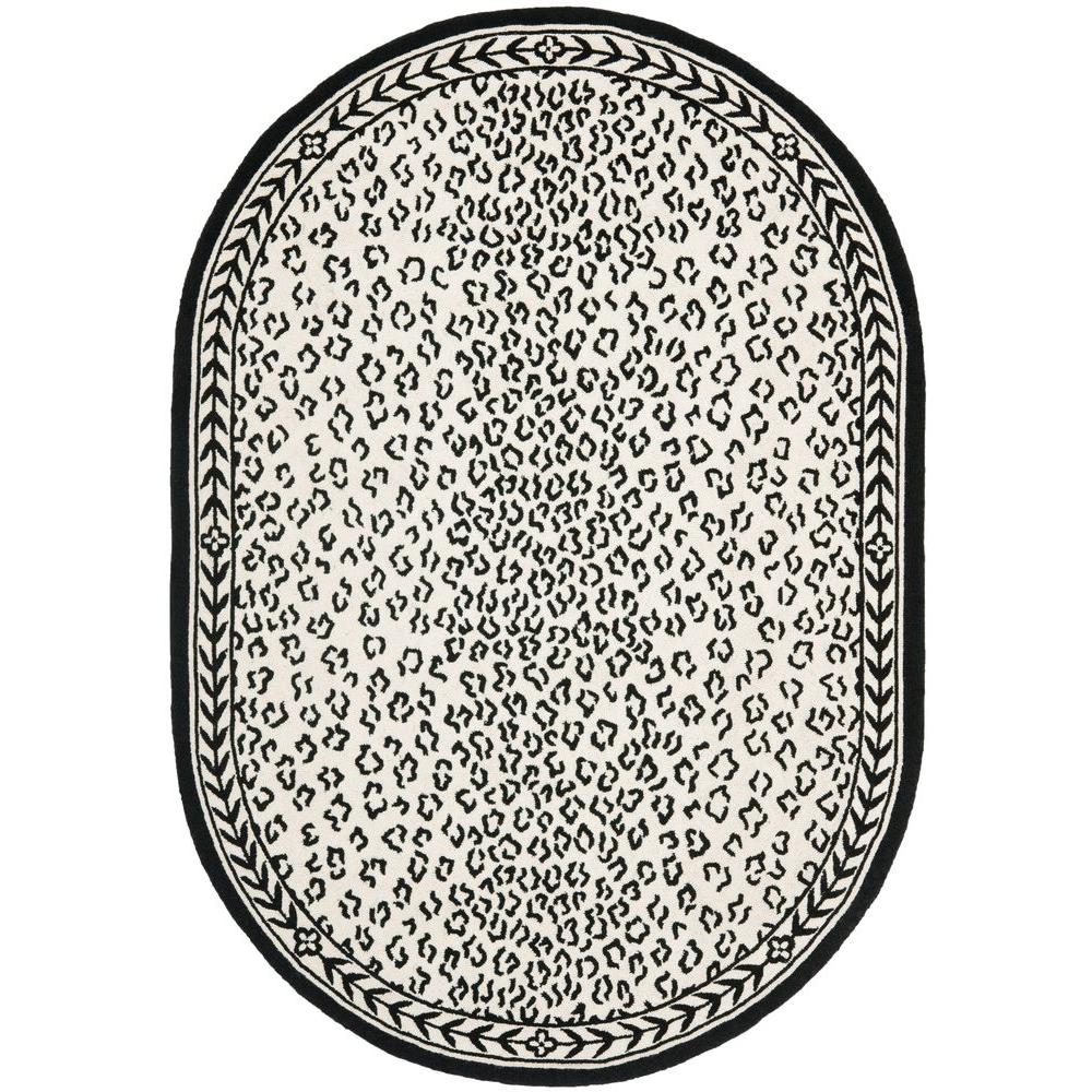Safavieh Chelsea White/Black 7 ft. 6 in. x 9 ft. 6 in. Oval Area RugHK15C8OV The Home Depot
