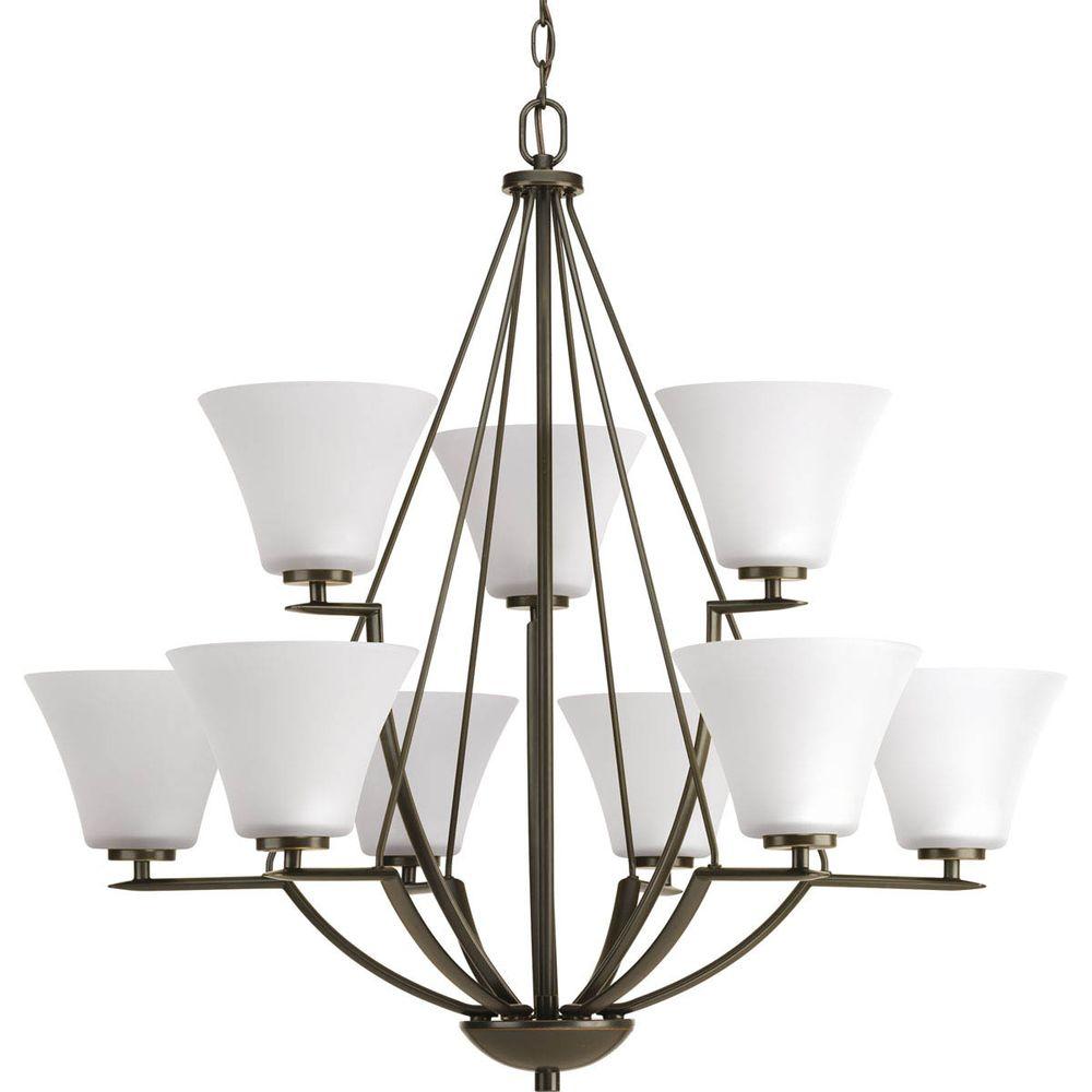 Progress Lighting Trinity 15 Light Antique Bronze Chandelier With Bravo Collection 9 Light Antique Bronze Chandelier With White Etched Gl Shade