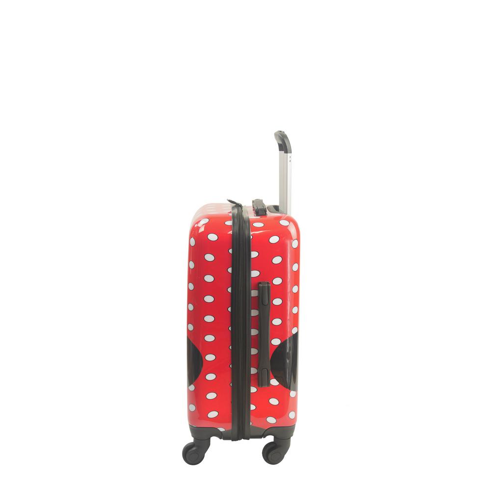 red polka dot luggage