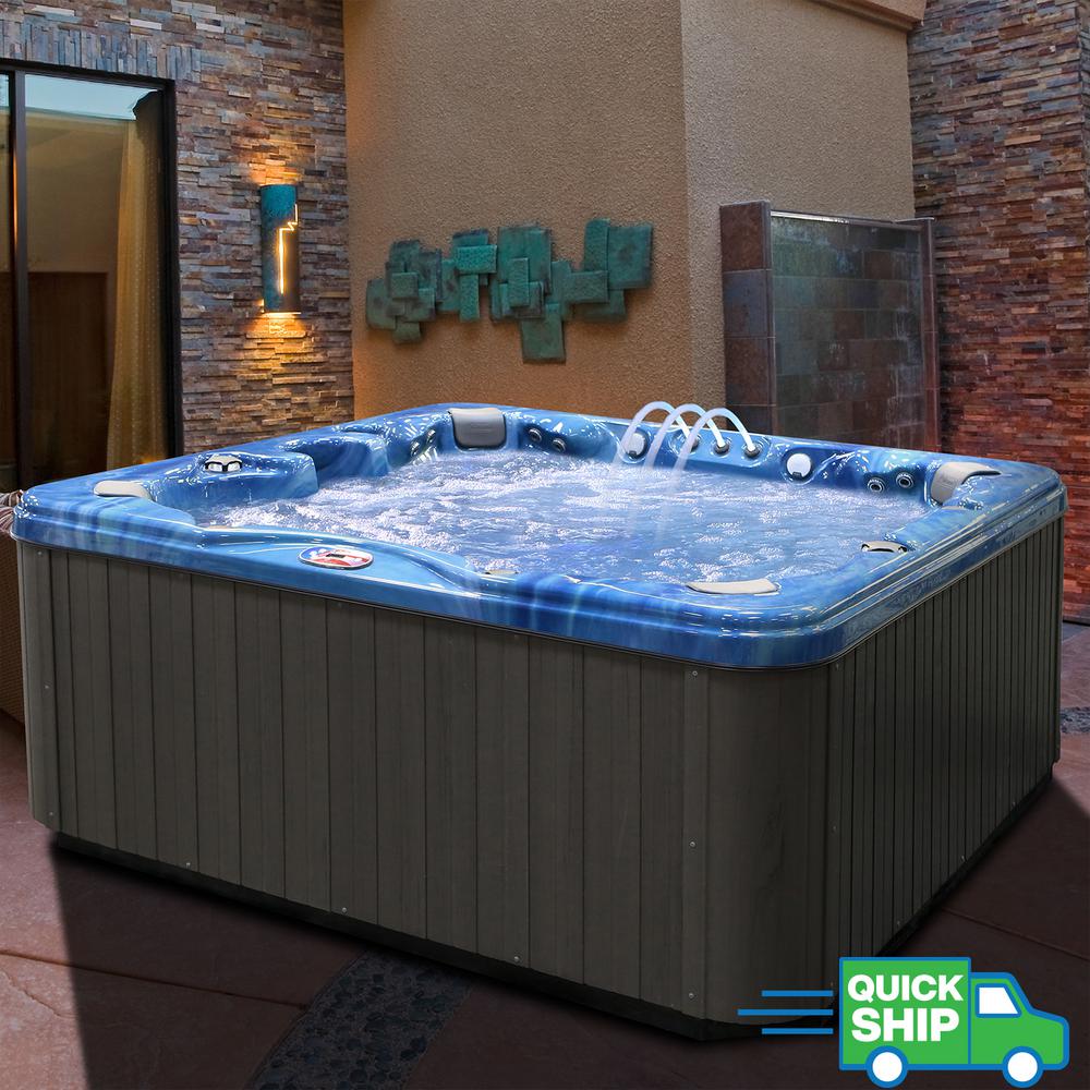 American Spas 7 Person 56 Jet Premium Acrylic Bench Spa Hot Tub With Bluetooth Stereo System Subwoofer And Backlit Led Waterfall