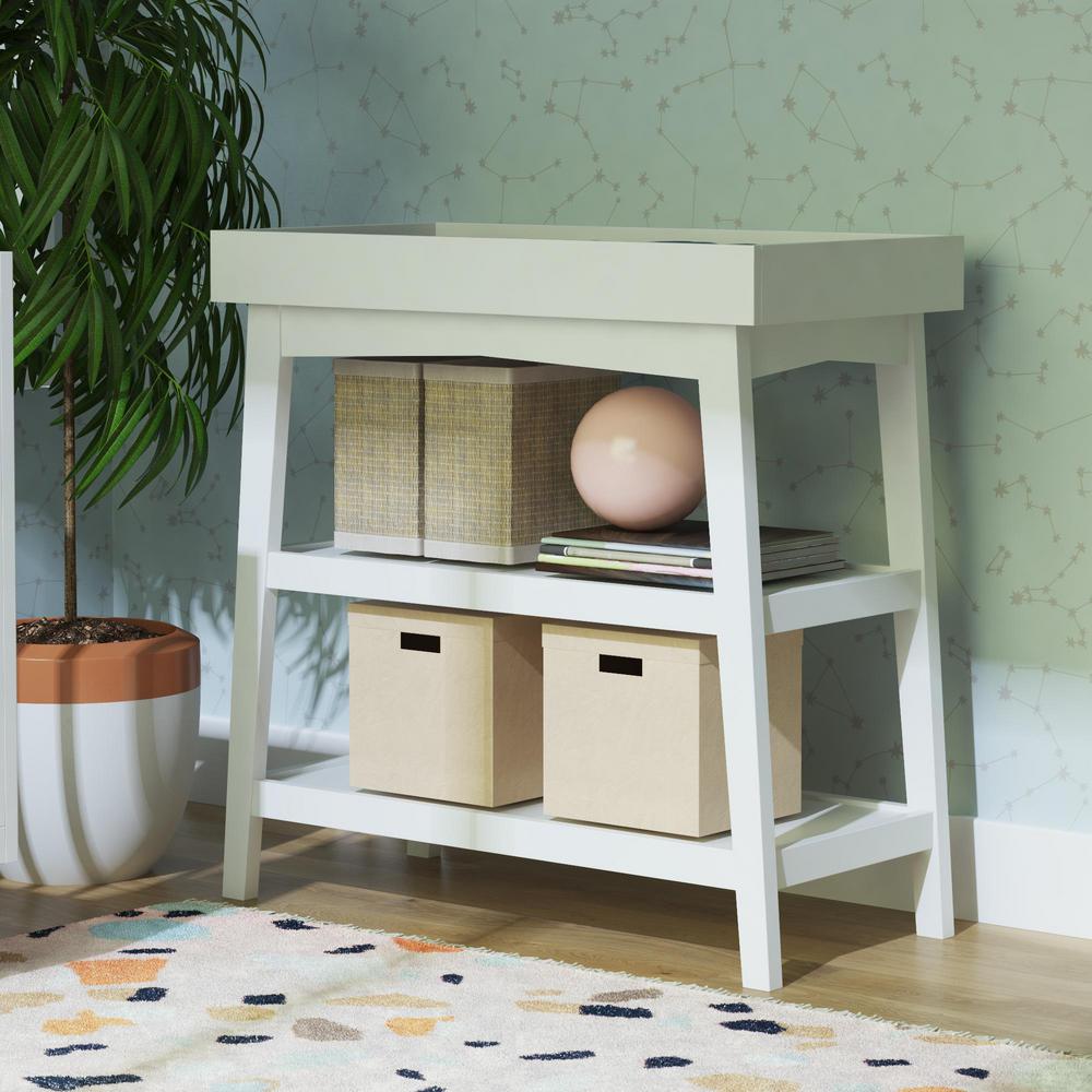 white wooden changing table