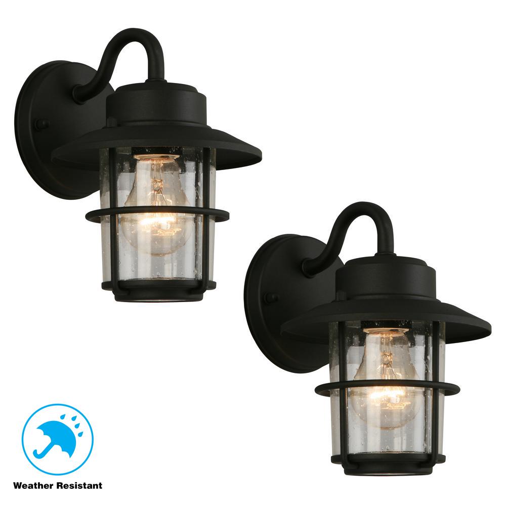 https://images.homedepot-static.com/productImages/fbde784e-e02d-4b3f-b6bf-7124f3e762ee/svn/black-hampton-bay-outdoor-lanterns-sconces-jbo1691a-4-64_100.jpg