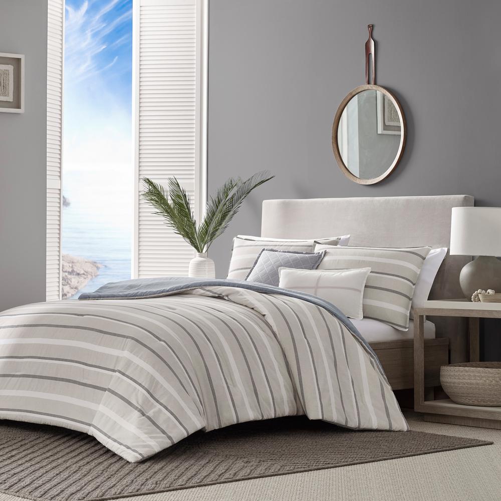 gray and tan bedding