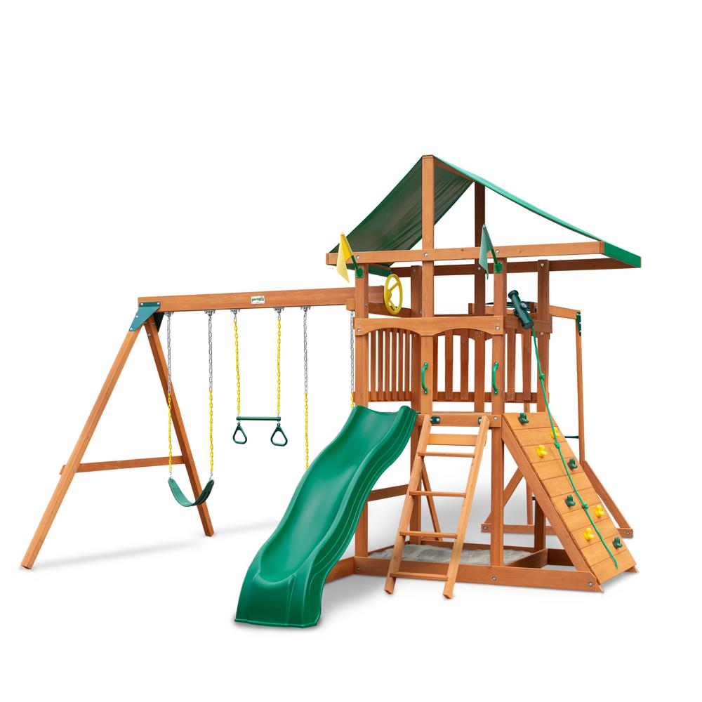 playset with rockwall and slide